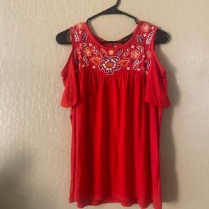 Red blouse with floral designs!